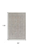 7' X 10' Silver Taupe and Blue Oriental Power Loom Worn Faded Area Rug With Fringe